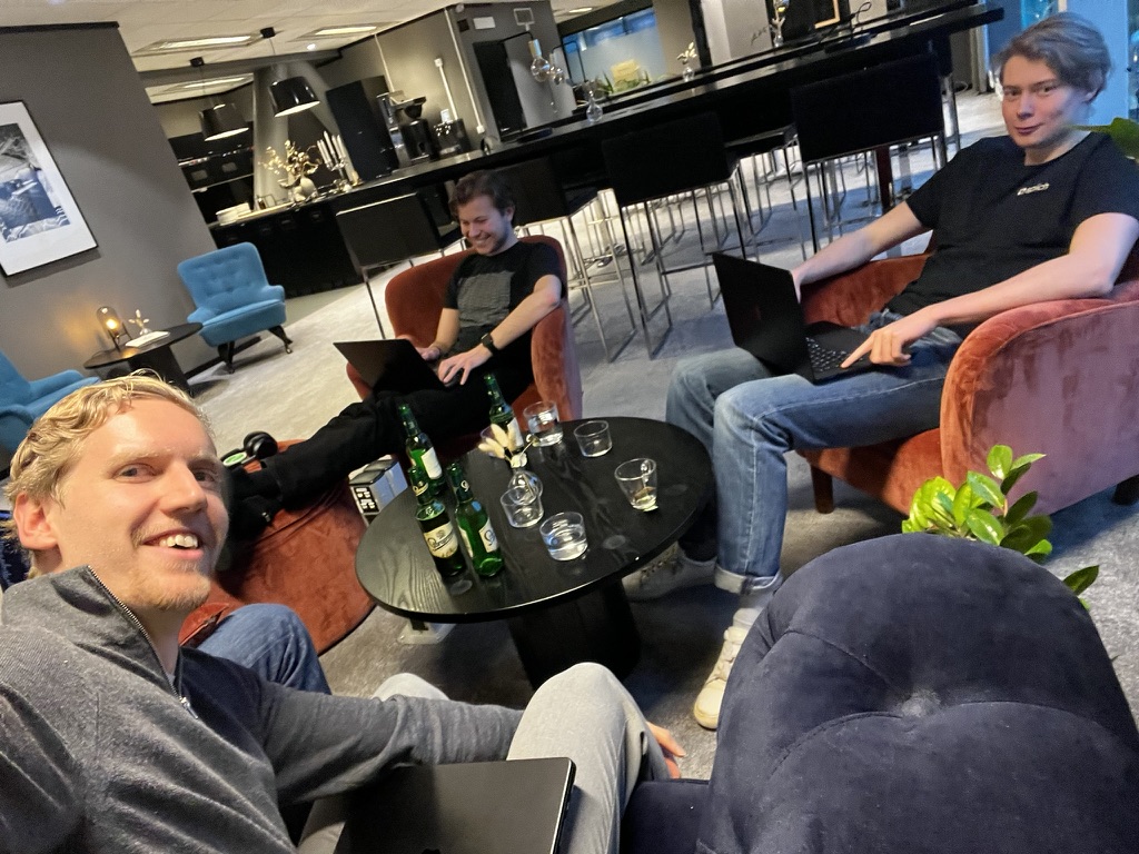 The team winding down together in the office lounge after shipping